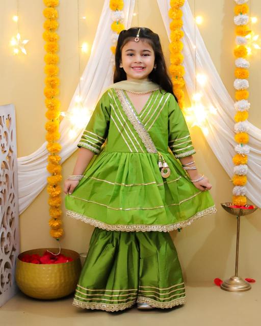 Art Riddhs vol 1 green Tapeta silk yog lesses work kids kurti wholesaler in surat  