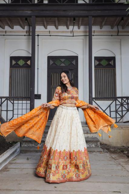 PRASANG 04  jecard viscose Orange Designer lehenga choli manufacturers in Gujarat