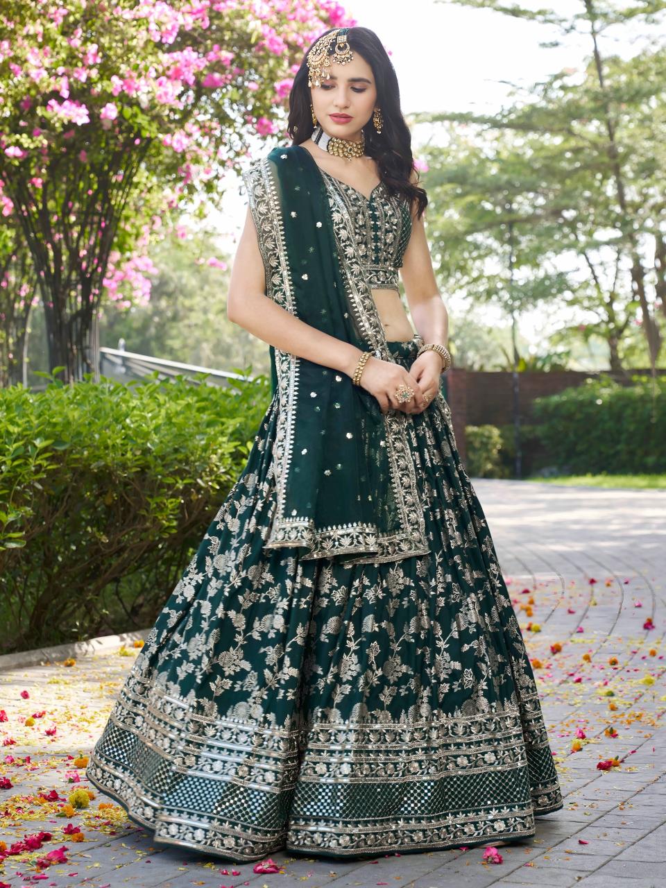 AMRAPALI Dola silk green Lehenga choli suppliers in India