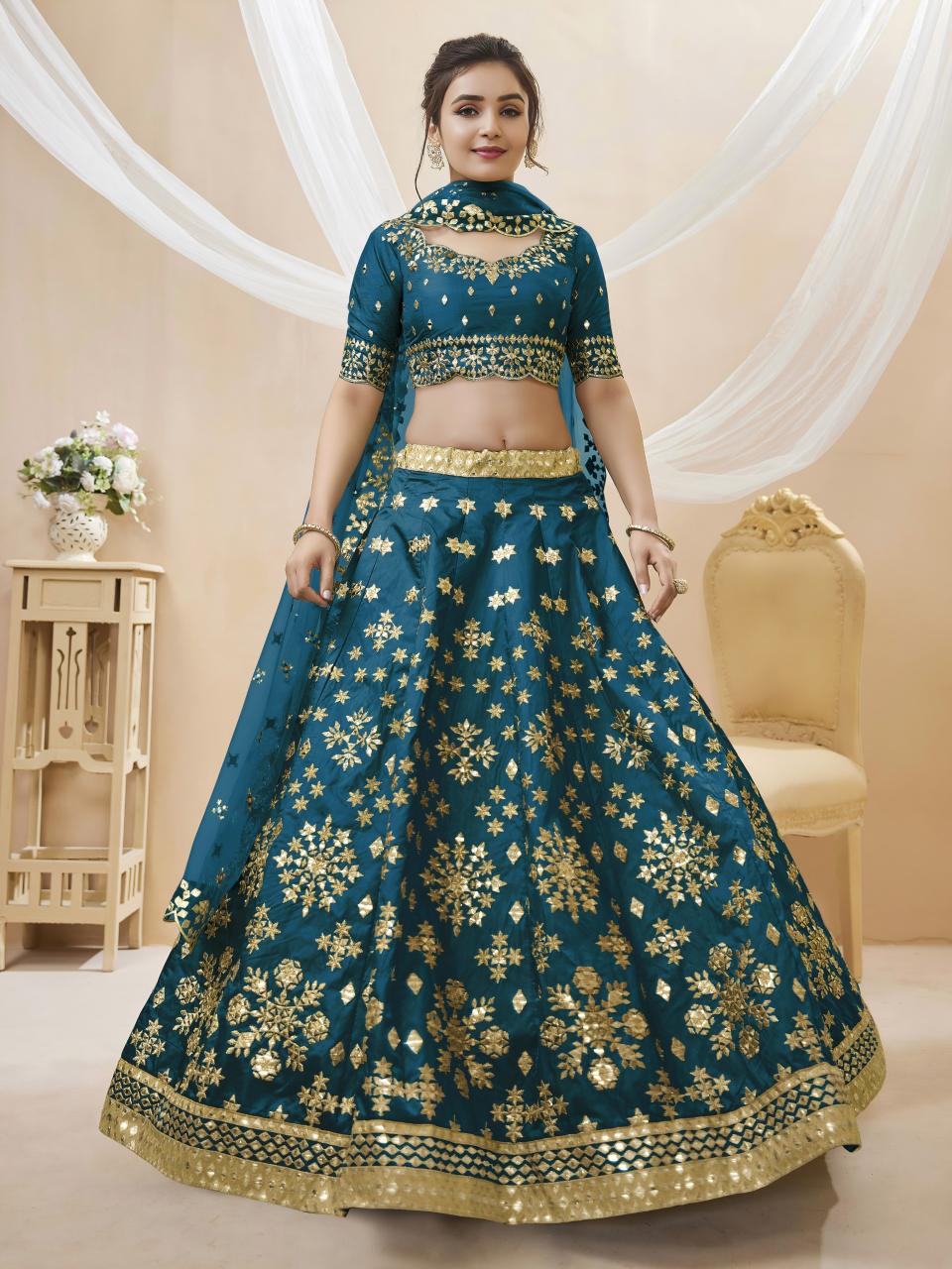 Angelic Silk Teal Blue Heavy embroidered lehenga choli