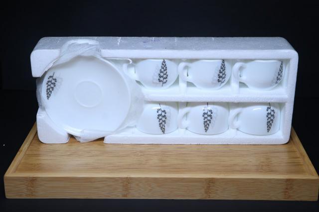 MG Elegant White Porcelain Cup & Saucer Set with Minimalist Floral Design crookery kitchen products at wholesale price