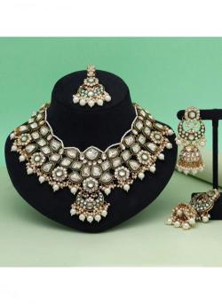 Bridal Wear White Color Meena Work Kunda Gold plated jewellery wholesalers in Surat